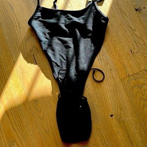 Frankie’s Bikinis High cut Black ribbed material.